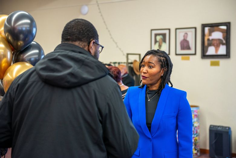 Dr. Rachel Issaka, a gastroenterologist at Fred Hutchinson Cancer Center, right, talks with a member of the First African Methodist Episcopal Church at a recent community screening and educational event to promote colorectal cancer awareness. The church partnered with Fred Hutch on the annual event this year to help connect members with information about colorectal cancer symptoms, ways to reduce risk and how to get up-to-date with screenings. (Connor O’Shaughnessy / Fred Hutchinson Cancer Center)