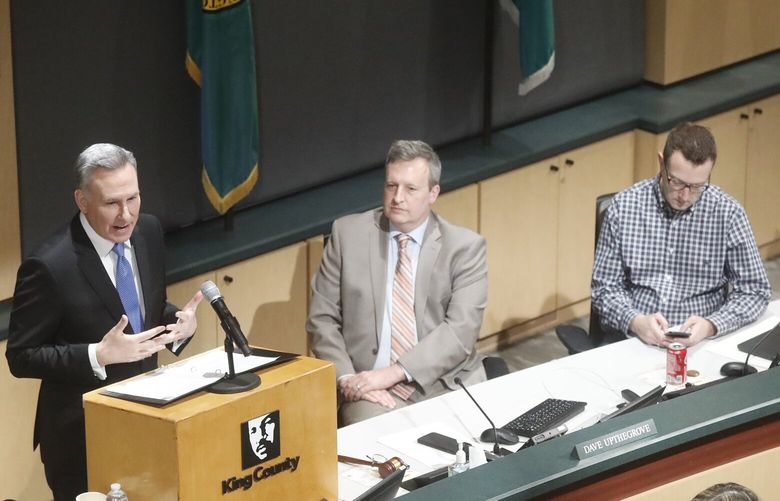 King County Executive Dow Constantine delivers his 2023 State of the County address at a meeting of the King County Council Tuesday, March 7, 2023.
County Council members listening from left are Dave Upthegrove, Joe McDermott, Girmay Zahlay 223239