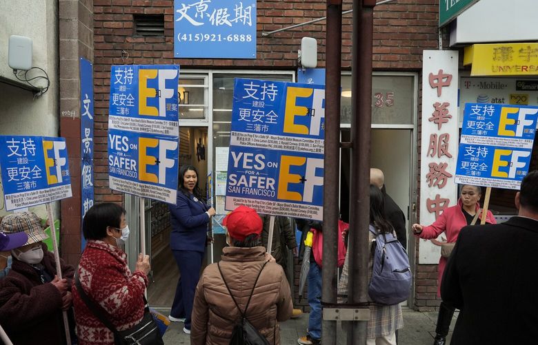 San Francisco Mayor London Breed, center left, walks in the city’s Chinatown district to encourage people to vote in the primary election Tuesday, March 5, 2024, in San Francisco. Breed also encouraged people to support Props C, E, and F. (AP Photo/Godofredo A. Vásquez)