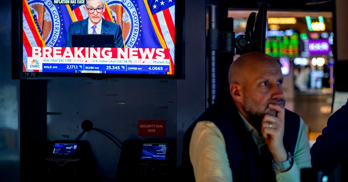 Wall Street rallies to records as Federal Reserve still sees rate cuts ...