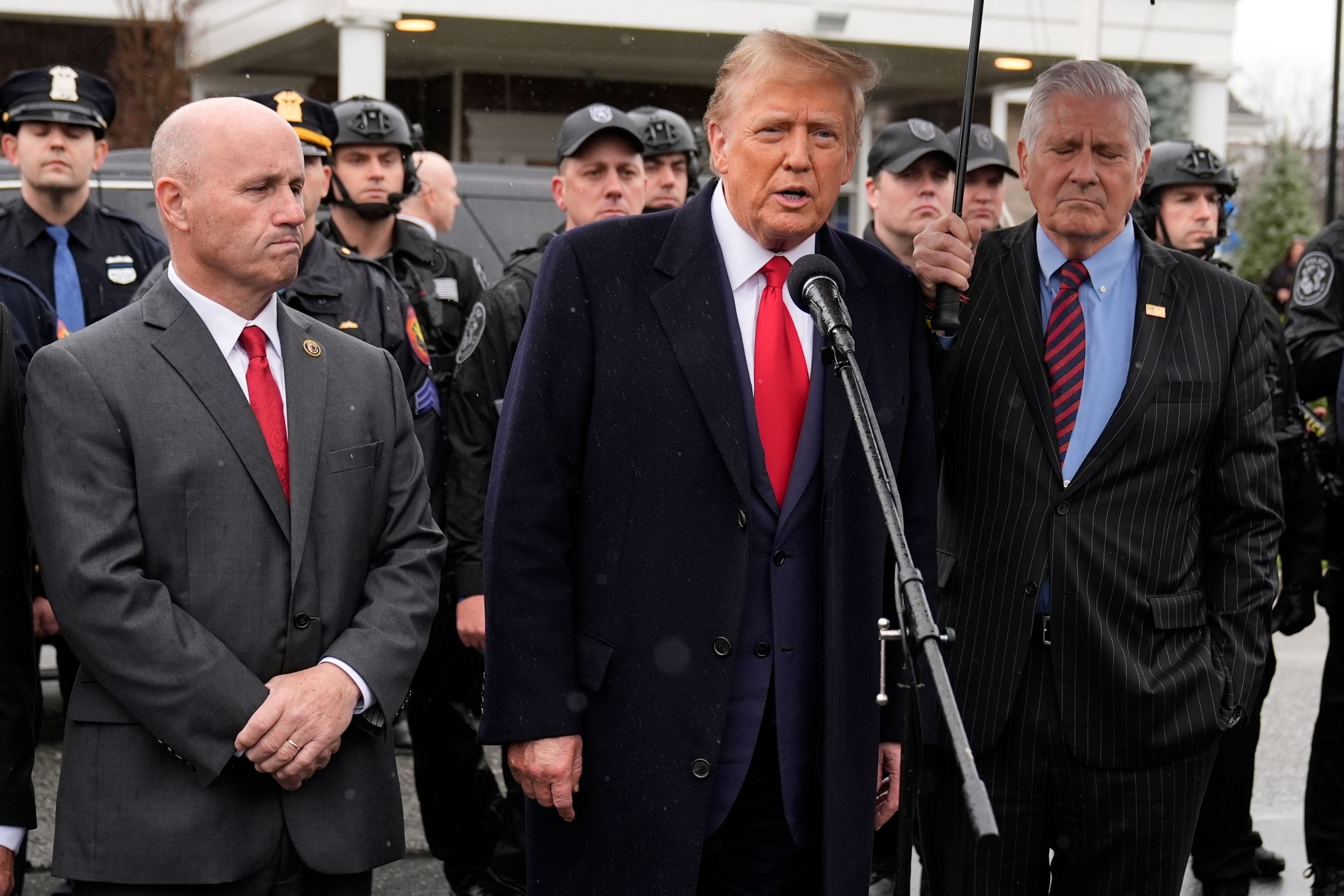 Trump attends wake of slain New York officer, calls for 'law and