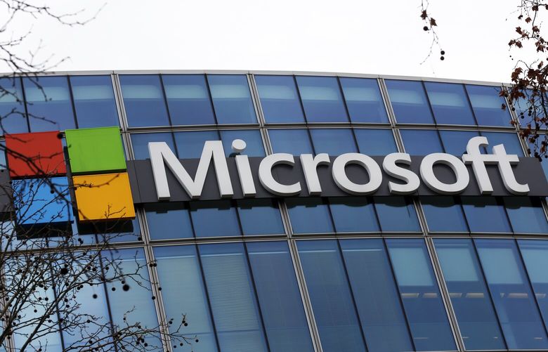 FILE – The Microsoft logo is pictured outside the headquarters in Paris, on Jan. 8, 2021. Microsoft said Thursday Aug. 31, 2023 its will stop combining its Teams messaging and videoconferencing app with its Office productivity software for European customers, in a move to head off a possible European Union antitrust penalty. (AP Photo/Thibault Camus, File)