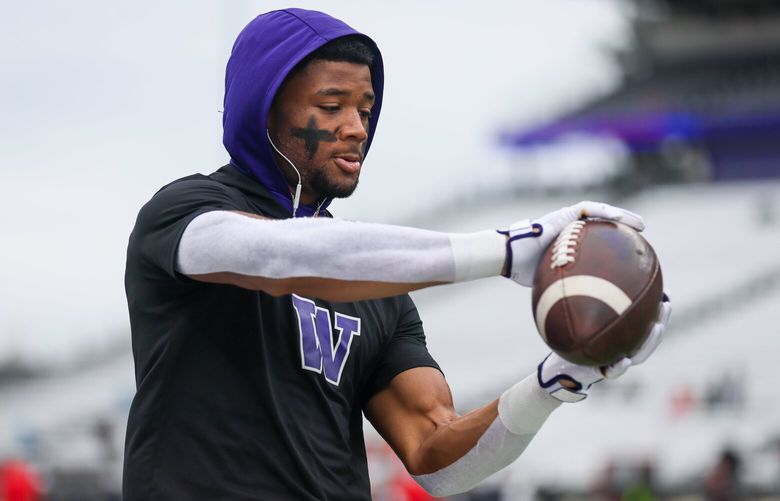 Washington Huskies running back Tybo Rogers warms up before the game Saturday afternoon at the Husky Stadium in Seattle, Washington on November 11, 2023.
 225478