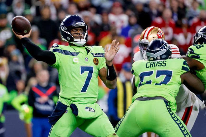 Seattle Seahawks quarterback Geno Smith throws out a pass during the third quarter against the 49ers in Seattle. (Jennifer Buchanan / The Seattle Times, 2023)