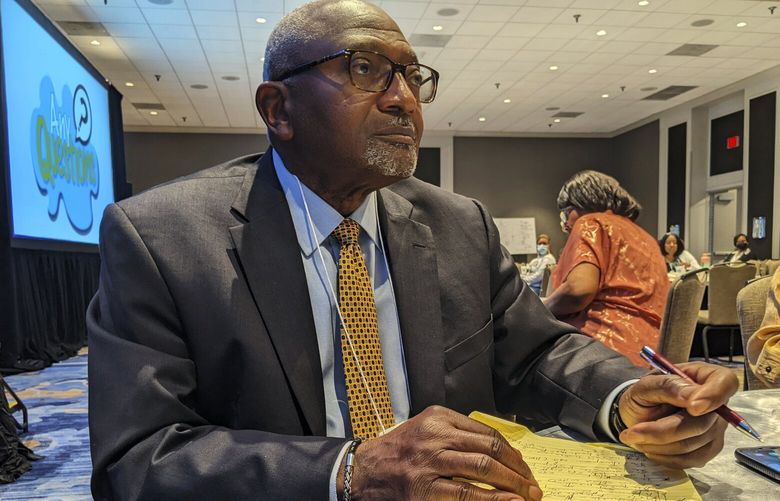 Robert Bullard, a conference co-founder and member of the White House Environmental Justice Advisory Council, takes notes at the HBCU Climate Change Conference in New Orleans, Friday, April 15, 2022. (AP Photo/Drew Costley)