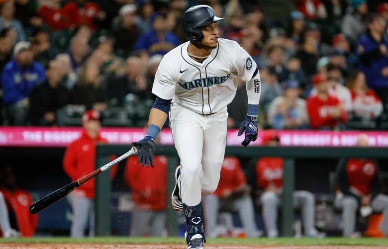 Seattle Mariners second baseman Jorge Polanco watches his three-run home run sail through the air during the first inning Monday, April 15, 2024 in Seattle. 226629