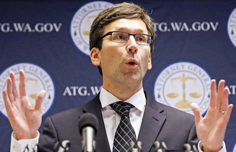 FILE- In this Nov. 28, 2017, file photo, Washington state Attorney General Bob Ferguson speaks at a news conference in Seattle. Premera Blue Cross is paying $10 million to a coalition of 30 states following an investigation into a major data breach. Attorney General Ferguson announced the settlement Thursday, July 11, 2019, several weeks after Premera said it would spend $74 million to settle a federal class-action lawsuit on behalf of affected customers. (AP Photo/Elaine Thompson, File) FX402
