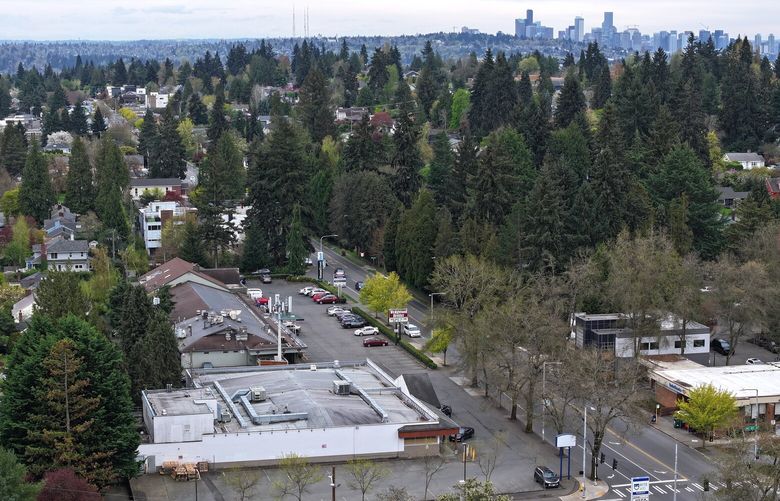 Aerial view of 35th Avenue NE looking south in the Wedgewood neighborhood in Seattle on Thursday, April 11, 2024. Two buildings on the left may be developed into a six-story neighborhood center.