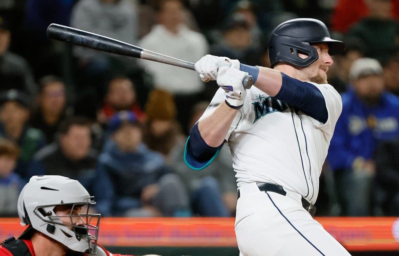 Seattle Mariners right fielder Luke Raley hits a RBI triple during the seventh inning Monday, April 15, 2024 in Seattle. 226629