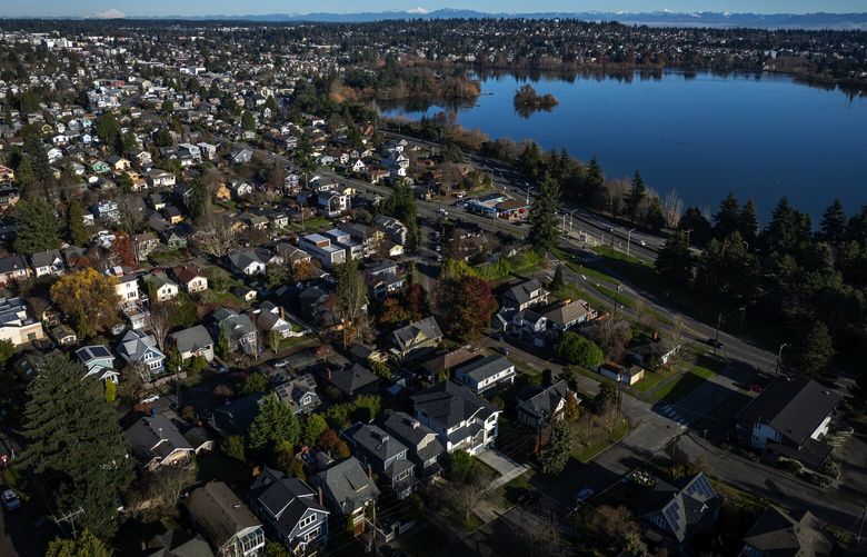 Seen from the air, Phinney Ridge single family homes along the westside of Green Lake, looking northeast, Tuesday, Dec. 12, 2023 in Seattle.