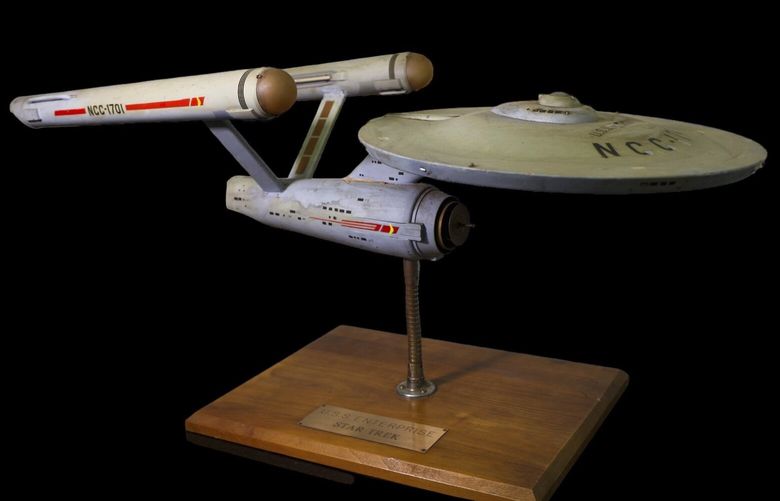 The first model of the USS Enterprise is displayed at Heritage Auctions in Los Angeles, April 13, 2024. The model — used in the original “Star Trek” television series — has been returned to Eugene “Rod” Roddenberry, the son of “Star Trek” creator Gene Roddenberry, decades after it went missing in the 1970s. (Josh David Jordan/Heritage Auctions via AP) RPJS108 RPJS108