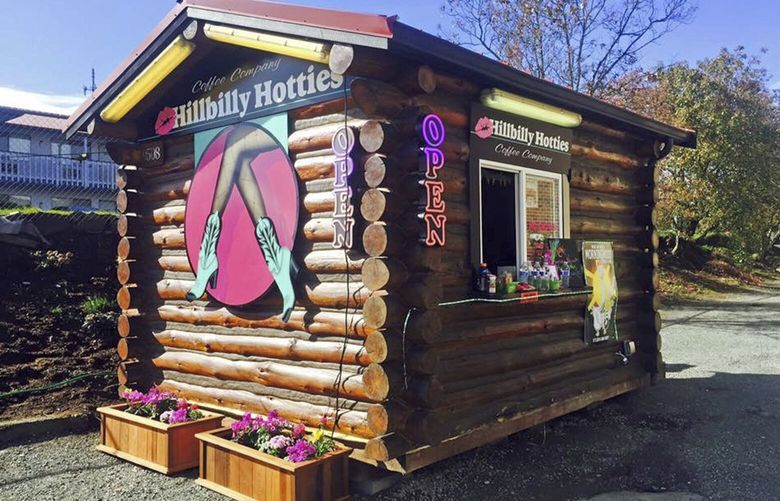 This July, 2016 photo provided by Jovanna Edge, who runs five Hillbilly Hotties stands, shows one of two Hillbilly Hotties espresso stands in Everett, Wash. Seven bikini baristas and Edge, the owner of the chain, sued the city of Everett on Monday, Sept. 11, 2017, saying two recently passed ordinances banning bare skin violate their right to free expression. (Jovanna Edge via AP) LA115