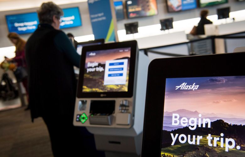 Alaska Air Group Inc. self check-in kiosks stand at the San Francisco International Airport (SFO) in San Francisco, California, U.S., on Friday, Jan. 19, 2018. Alaska Air Group Inc. is scheduled to release earnings on January 25.
