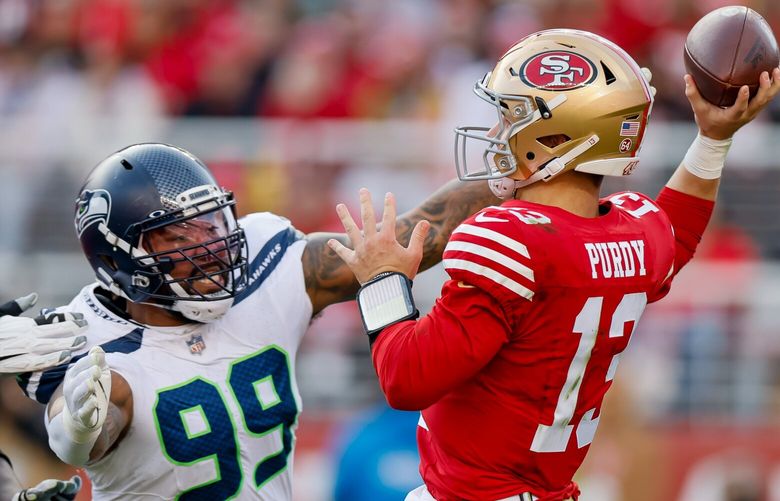 Seattle Seahawks defensive end Leonard Williams tries to get to San Francisco 49ers quarterback Brock Purdy during the second quarter Sunday, Dec. 10, 2023 in Santa Clara, Calif. 225695