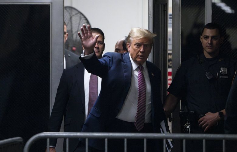 Former President Donald Trump arrives outside the courtroom for his criminal trial at Manhattan Criminal Court in Manhattan, Friday, April 19, 2024. Trump is accused of falsifying business records to cover up a sex scandal that threatened to derail his 2016 campaign. Jury selection in his trial could wrap up Friday as lawyers work to choose alternates. (Maansi Srivastava/The New York Times) XNYT0313 XNYT0313