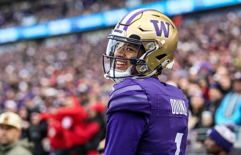 Washington Huskies wide receiver Rome Odunze is all smiles after a no call from the referee Saturday afternoon at the Husky Stadium in Seattle, Washington on November 11, 2023. The Huskies won 35-28. 225478