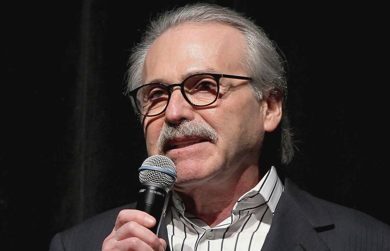 FILE – David Pecker, chairman and CEO of American Media, speaks at an event, Jan. 31, 2014 in New York. Pecker is The National Enquirer’s former publisher and a longtime friend of Donald Trump. Prosecutors say he met with Trump and Trump’s former lawyer Michael Cohen at Trump Tower in August 2015 and agreed to help Trump’s campaign identify negative stories about him. (Marion Curtis via AP, File) WX508 WX508