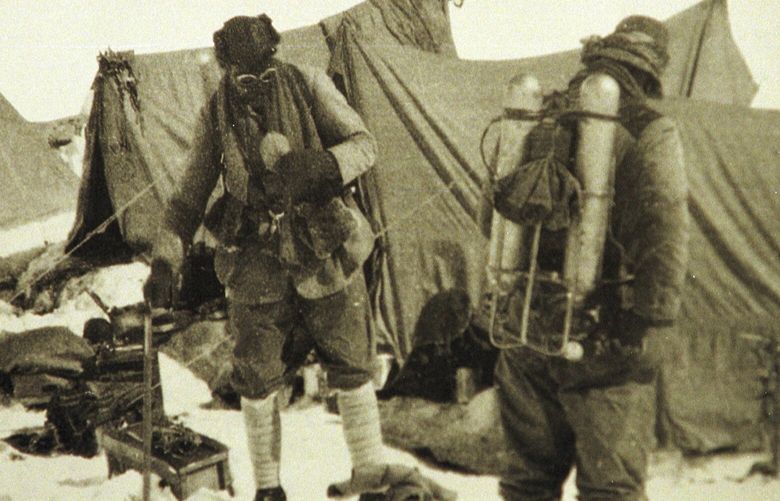 FILE – British mountaineers George Mallory is seen with Andrew Irvine at the base camp in Nepal, both members of the Mount Everest expeditions 1922 and 1924, as they get ready to climb the peak of Mount Everest June 1924. It is the last image of the men before they disappeared in the mountain. George Mallory’s final letter to his wife before he vanished on Mount Everest a century ago tried to ease her worries though he said his chances of reaching the world’s highest peak were “50 to 1 against us.” (AP Photo, File) XPAG150 XPAG150