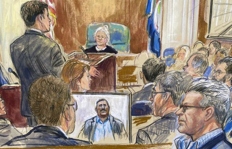 This artist sketch depicts Salah Al-Ejaili, foreground right with glasses, a former Al-Jazeera journalist, before the U.S. District Court in Alexandria, Va., Tuesday, April 16, 2024.  Al-Ejaili, a former detainee at the infamous Abu Ghraib prison, has described to jurors the type of abuse that is reminiscent of the scandal that erupted there 20 years ago: beatings, being stripped naked and threatened with dogs, stress positions meant to induce exhaustion and pain. (Dana Verkouteren via AP) VADV203 VADV203
