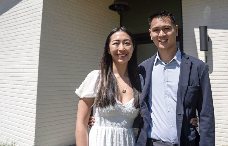 Veronica Yam and Dexter Chan are shown at their new home  in the Michigan Park neighborhood. They bought a house with space for a renter, allowing them to pick a larger house and offset their mortgage with rental income. (MUST CREDIT: Michael Robinson Ch·vez for The Washington Post)