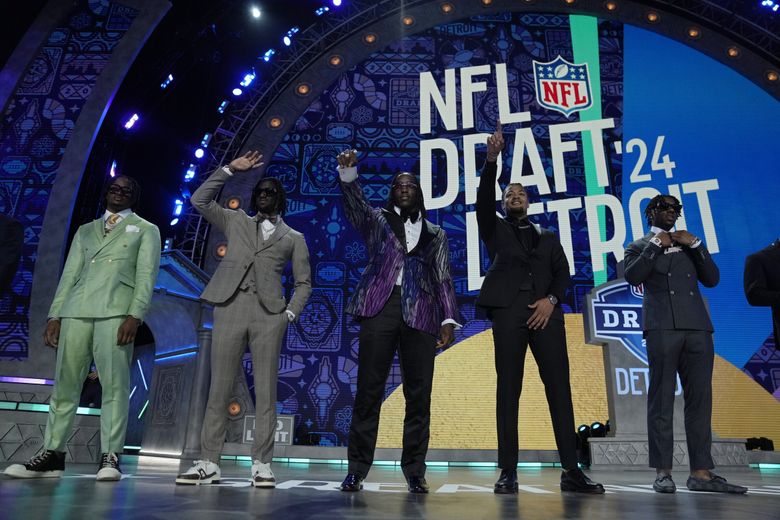 Top prospects stand on stage before the first round of the NFL football draft, Thursday, April 25, 2024, in Detroit. (AP Photo/Jeff Roberson) MIJL153 MIJL153 (Jeff Roberson / The Associated Press)