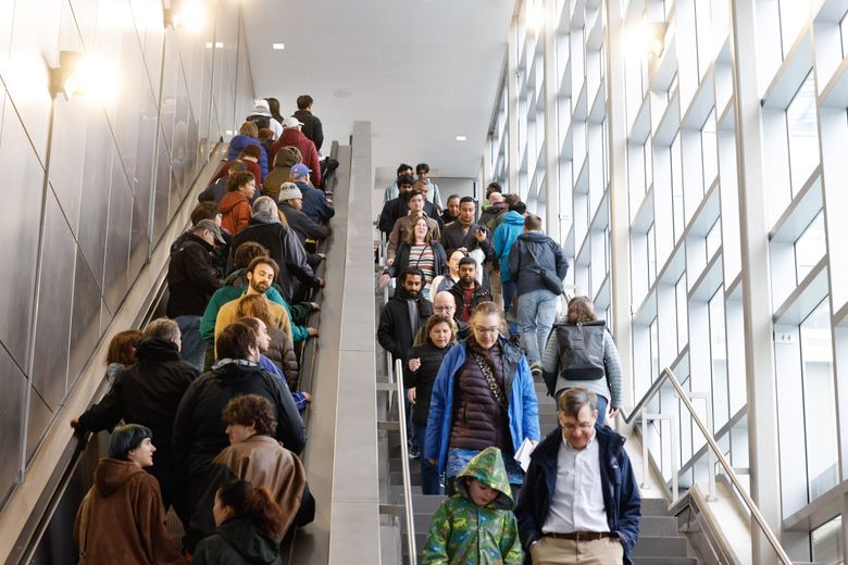 Crowds turn out to ride the 2 Line at the Redmond Technology Station in Redmond on Saturday.  (Karen Ducey / The Seattle Times)