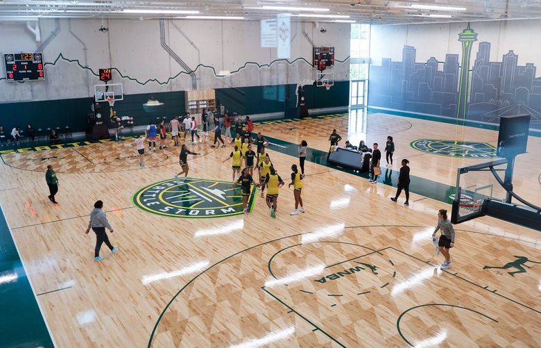 The Seattle Storm high-five each other during a scrimmage on the first day of training camp Sunday, April 28, 2024 in Seattle. 226704