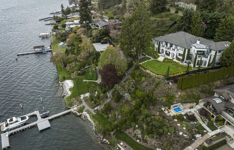 Russell Wilson’s home, which is for sale, is seen from the air Tuesday, April 12, 2022 in Bellevue. 220112
