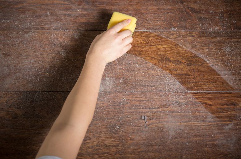 A little light-intensity activity, like cleaning the house, is a solid first step toward better health. For dusty places, opt for a wet rag or sponge over dusters. (Getty Images)