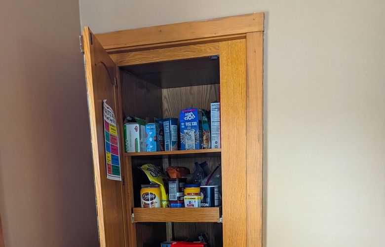 This is just a small pantry, right? Or do all the shelves roll out and rotate to the right, revealing access to a tiny room behind the wall? Use your imagination. (Tim Carter/Tribune Content Agency)