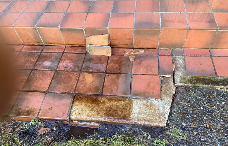 Freezing water under the tile caused the tile to lift off the concrete. The tile setter made at least one mistake. (Tim Carter/Tribune Content Agency)