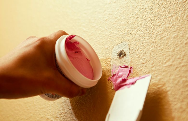 Some dry time indicator spackling changes from pink to white when it is dry enough for the next step. It costs more than a similar spackle that’s always white, however. (Getty Images)