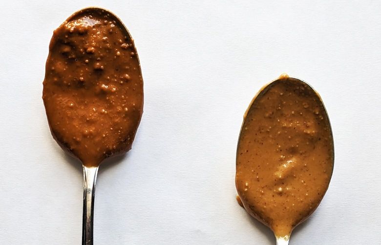 CB’s Nuts organic dark roast peanut butter (left) is only slightly darker in appearance than Adam’s 100% Natural (right). but its taste is much richer.