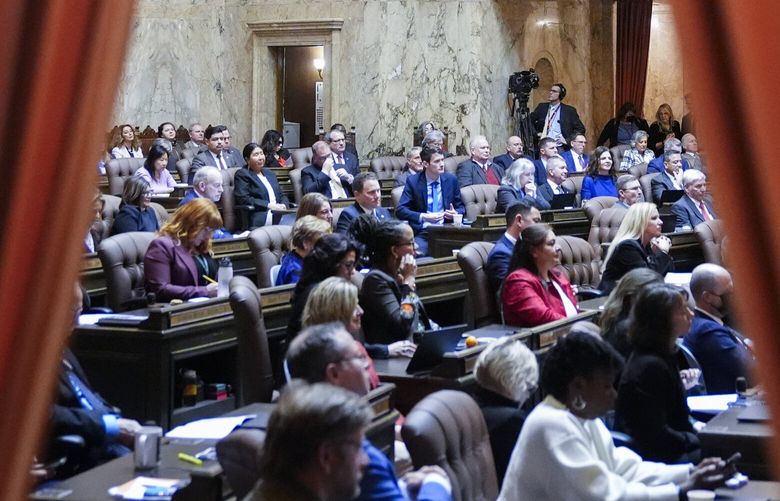 Legislators listen to the State of the State address from Gov. Jay Inslee on the second day of the legislative session at the Washington state Capitol, Tuesday, Jan. 9, 2024, in Olympia, Wash. (AP Photo/Lindsey Wasson)