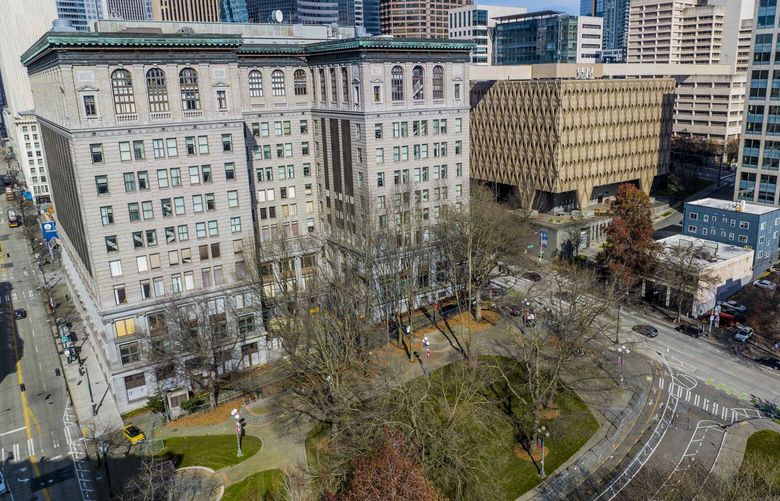 From left, The King County Courthouse, Administrative Building and Corrections Facility in Seattle on Tuesday, March 7, 2023. Dow Constantine is proposing redeveloping the county government’s campus to bring a mix of residential and commercial uses to the area.