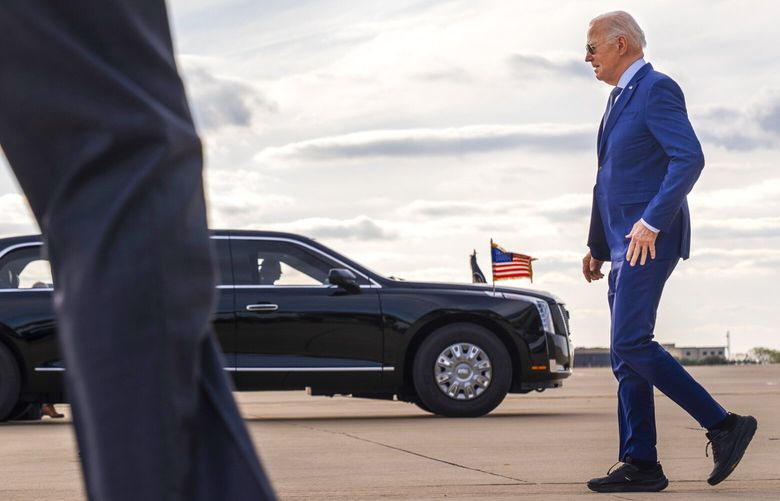President Joe Biden walks to his motorcade after departing Air Force One, Wednesday March 20, 2024, on arrival at Dallas-Fort Worth International Airport, in Dallas. (AP Photo/Jacquelyn Martin) TXJM101
