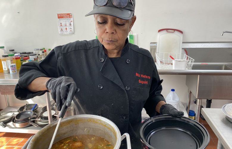 Jess Henton serves gumbo she made at Ms. Helen’s Soul Bistro, a pop-up eatery she operates out of the Central Area Youth Association community center. She is in the process of reopening the restaurant her mother, Helen Coleman, started in 1970.