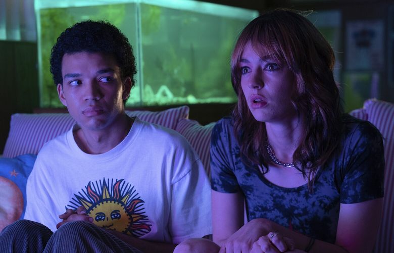 This image released by A24 shows Justice Smith, left, and Brigette Lundy-Paine in a scene from “I Saw the TV Glow.” (A24 via AP) GAAK332 GAAK332