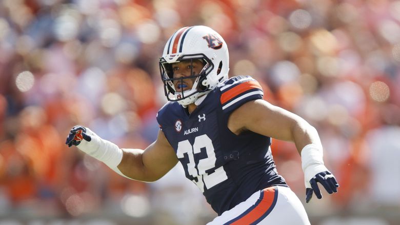 Auburn linebacker Wesley Steiner (32) defends during the first half of an NCAA football game against Georgia on Saturday, Sept. 30, 2023, in Auburn, Ala. (AP Photo/Stew Milne)