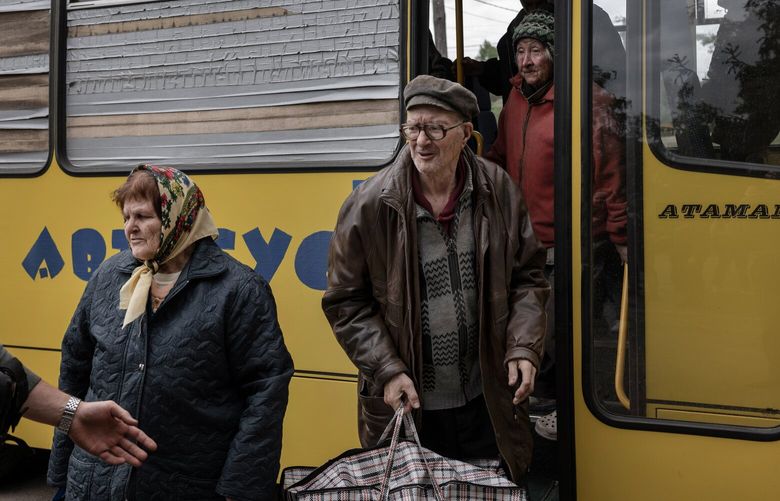 Residents of Vovshansk and surrounding areas arrive to an evacuation point in the Kharkiv region of Ukraine, on May 11, 2024. Russia’s latest offensive has expanded the battlefield along Ukraine’s northern border, and sent thousands of civilians fleeing to the closest large city. (Emile Ducke/The New York Times) XNYT0811 XNYT0811