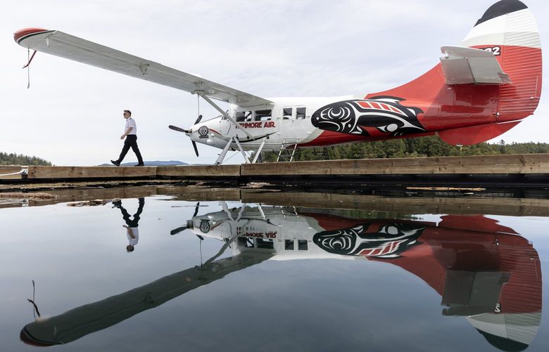 Steve Bjorling, a pilot with Kenmore Air, walks on a dock after landing a seaplane in Friday Harbor on Tuesday, May 14, 2024. The Puyallup Tribe is opening a seaplane service to San Juan Island from Tacoma.