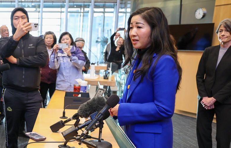 Tanya Woo fields questions after the end of the session where she was appointed to fill the open seat on the city council Tuesday afternoon at city hall in Seattle, Washington, on January 23, 2024. 226006