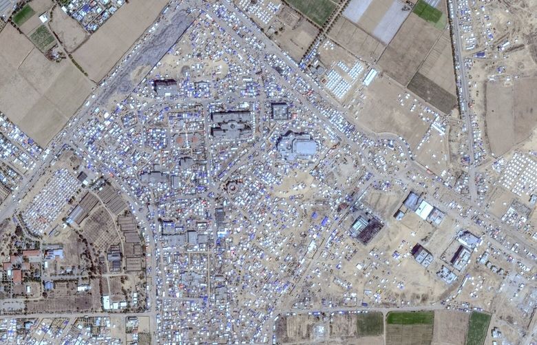 In the second of a two-photo-combo, a satellite view shows a greatly increased number of tents and shelters in an area of Khan Younis in the southern Gaza Strip on May 15, 2024, nine days after Israel ordered civilians to evacuate nearby Rafah. The hundreds of thousands of people who have since arrived in Al-Mawasi, a beachside area that Israel has designated as a â€œhumanitarian zone,â€ have encountered miserable conditions in their new encampments and shelters. (Satellite image Â©2024 Maxar Technologies via The New York Times)  â€“ NO SALES, FOR EDITORIAL USE ONLY WITH NYT STORY ISRAEL GAZA by KIM of MAY 21, 2024. ALL OTHER USE PROHIBITED, MAXAR WATERMARK MUST NOT BE CROPPED OUT â€“ XNYT0822 XNYT0822
