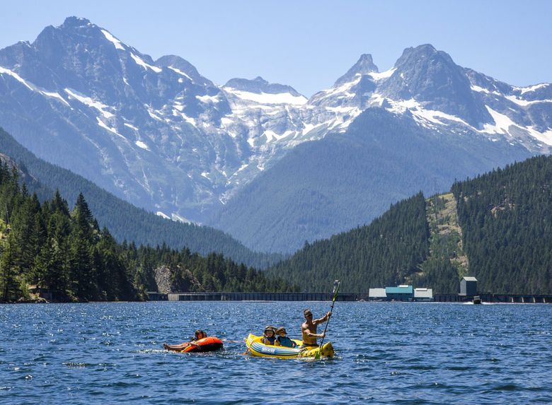 The Ross Lake National Recreation Area, a favorite for boaters and floaters, is one of the most popular ways to access North Cascades National Park. (Steve Ringman / The Seattle Times, 2014)
