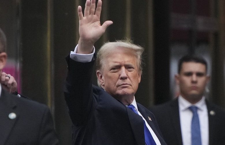Former President Donald Trump waves as he arrives at Trump Tower after he was found guilty of all counts in his criminal trial in New York, on Thursday, May 30, 2024. Trump has been convicted of falsifying records to cover up a sex scandal that threatened his ascent to the White House in 2016, part of a scheme that prosecutors described as a fraud on the American people. He is the first American president to be declared a felon. (Hiroko Masuike/The New York Times) XNYT0784 XNYT0784