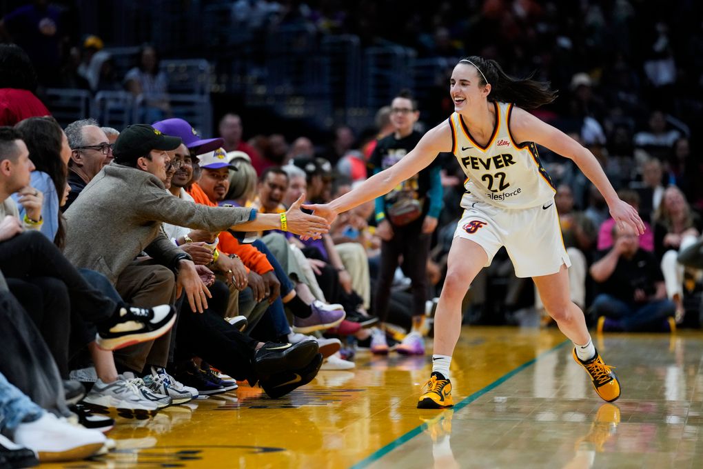 Caitlin Clark and Indiana Fever win 1st game of season, beat LA Sparks  78-73 in front of 19,103 | The Seattle Times