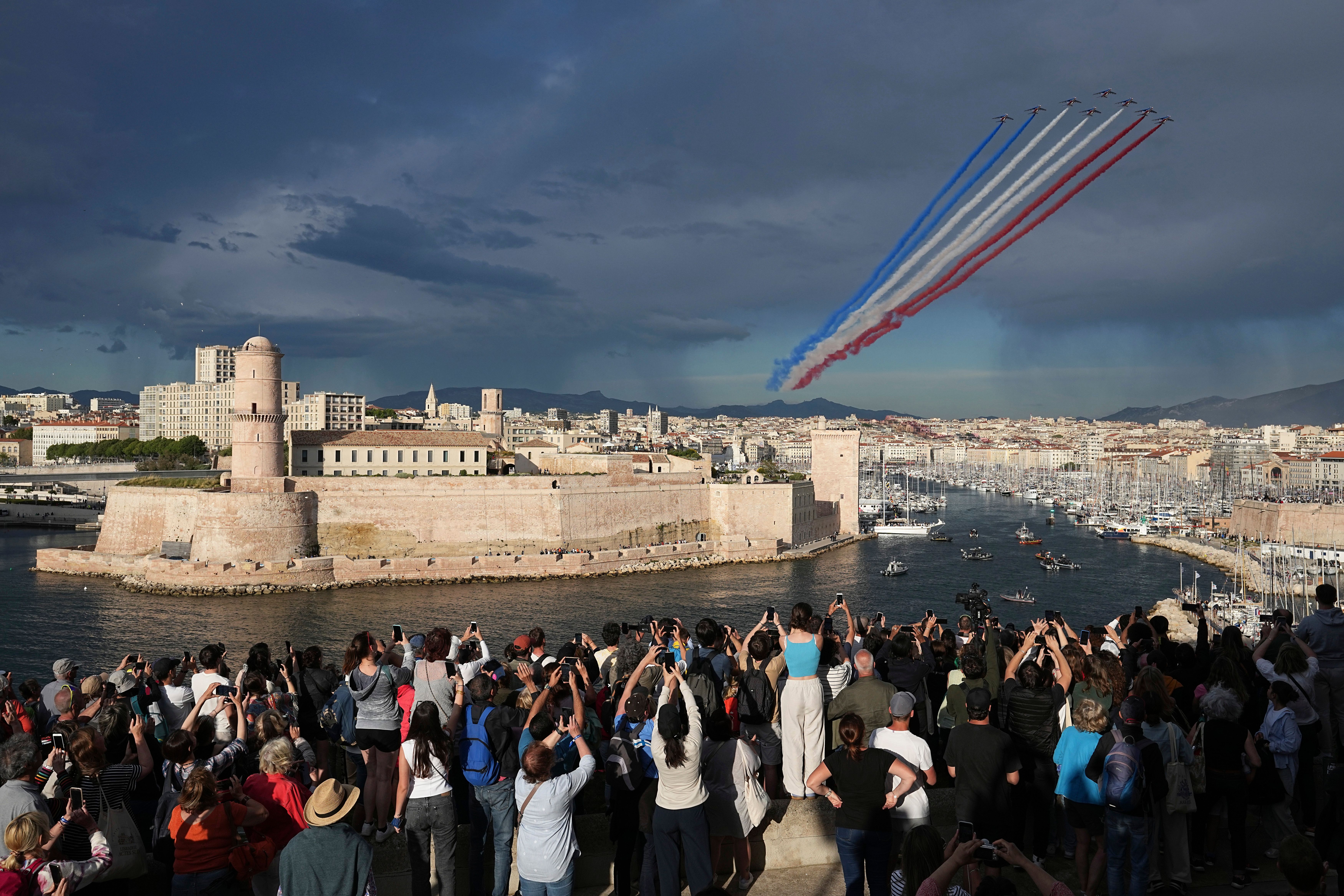 Olympic torch begins journey across France after festive welcome