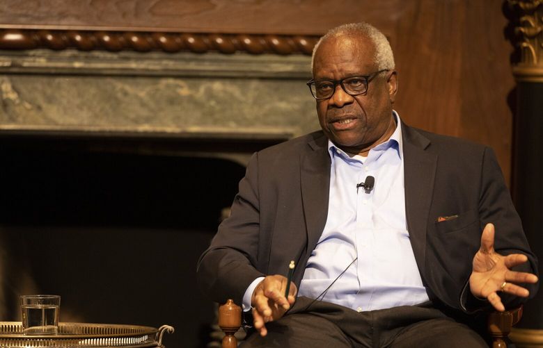 FILE â€” Supreme Court Justice Clarence Thomas at a conference in Dallas on May 13, 2022. Thomas acknowledged on June 7, 2024 instances of additional luxury travel he had accepted from a conservative billionaire, amending a previous financial disclosure to reflect trips he had taken to an Indonesian island and a secretive all-male club in the Northern California redwoods. (Allison V. Smith/The New York Times) XNYT0216 XNYT0216