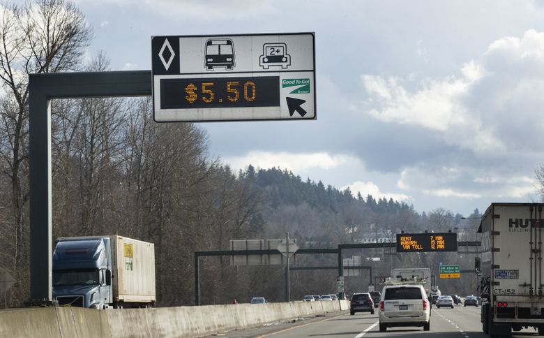 Cars head south on Highway 167, just south of Interstate 405, as the toll flashes $5.50. The max toll was raised recently to $15, and it was reached on a recent day before 3 p.m. (Ellen M. Banner / The Seattle Times)