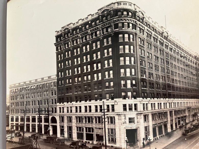 The White-Henry-Stuart buildings on Fourth Avenue. Terra-cotta busts form a repeated band between the 10th-floor windows. (Asahel Curtis)